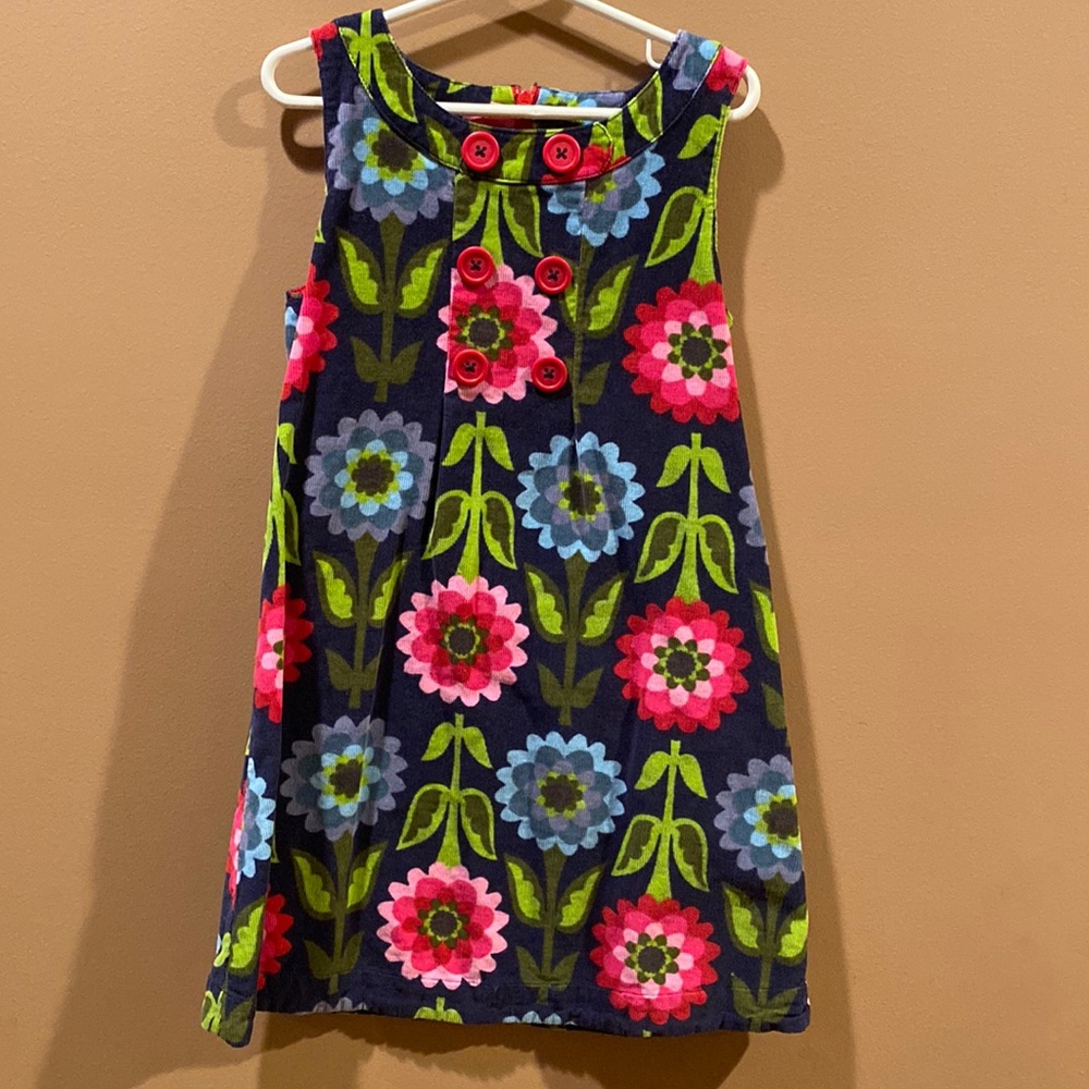 Mini Boden corduroy dress with pink and blue flowers.  Girls size 7/8